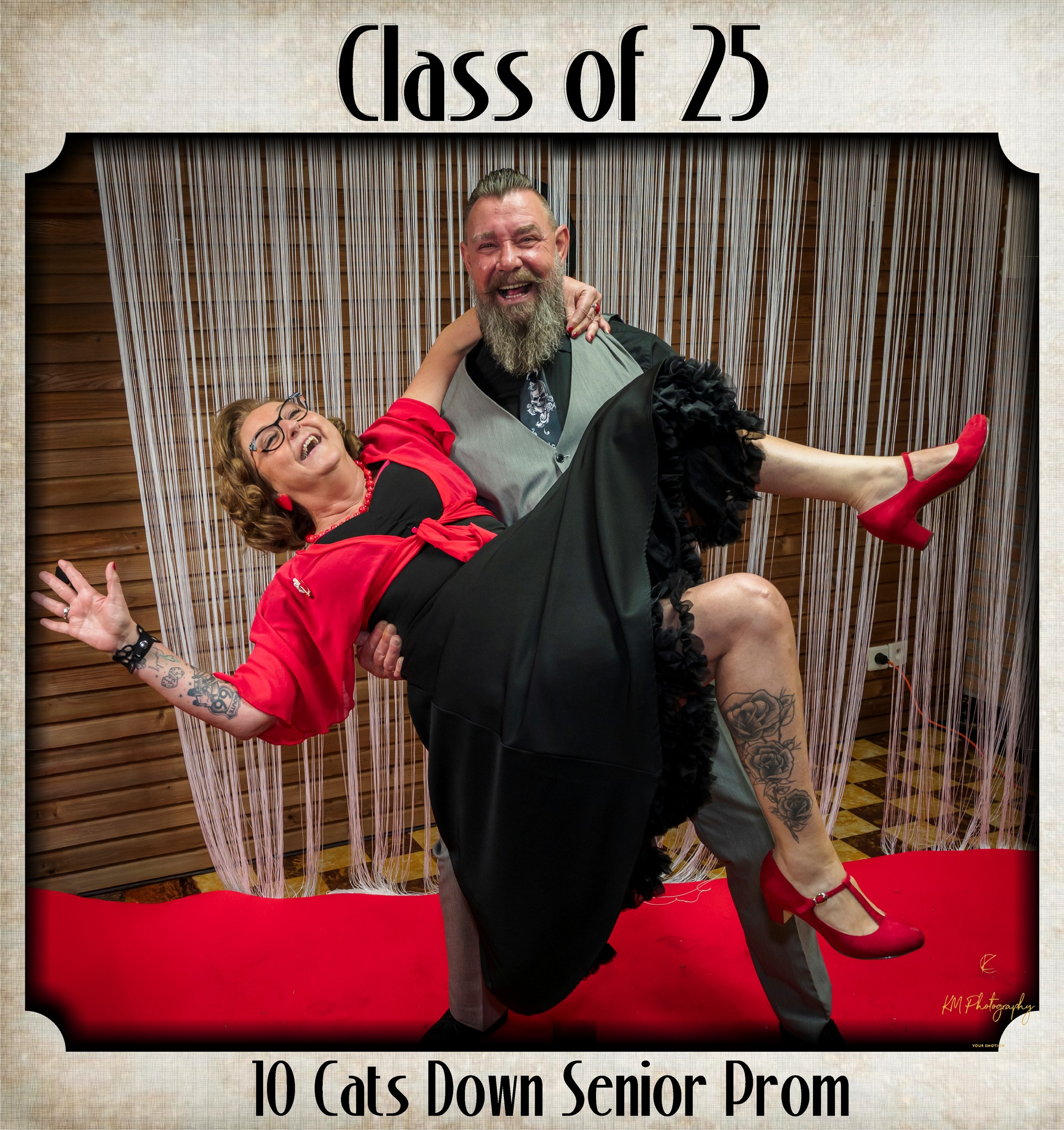 Couple enjoying the prom with fun photo booth moment