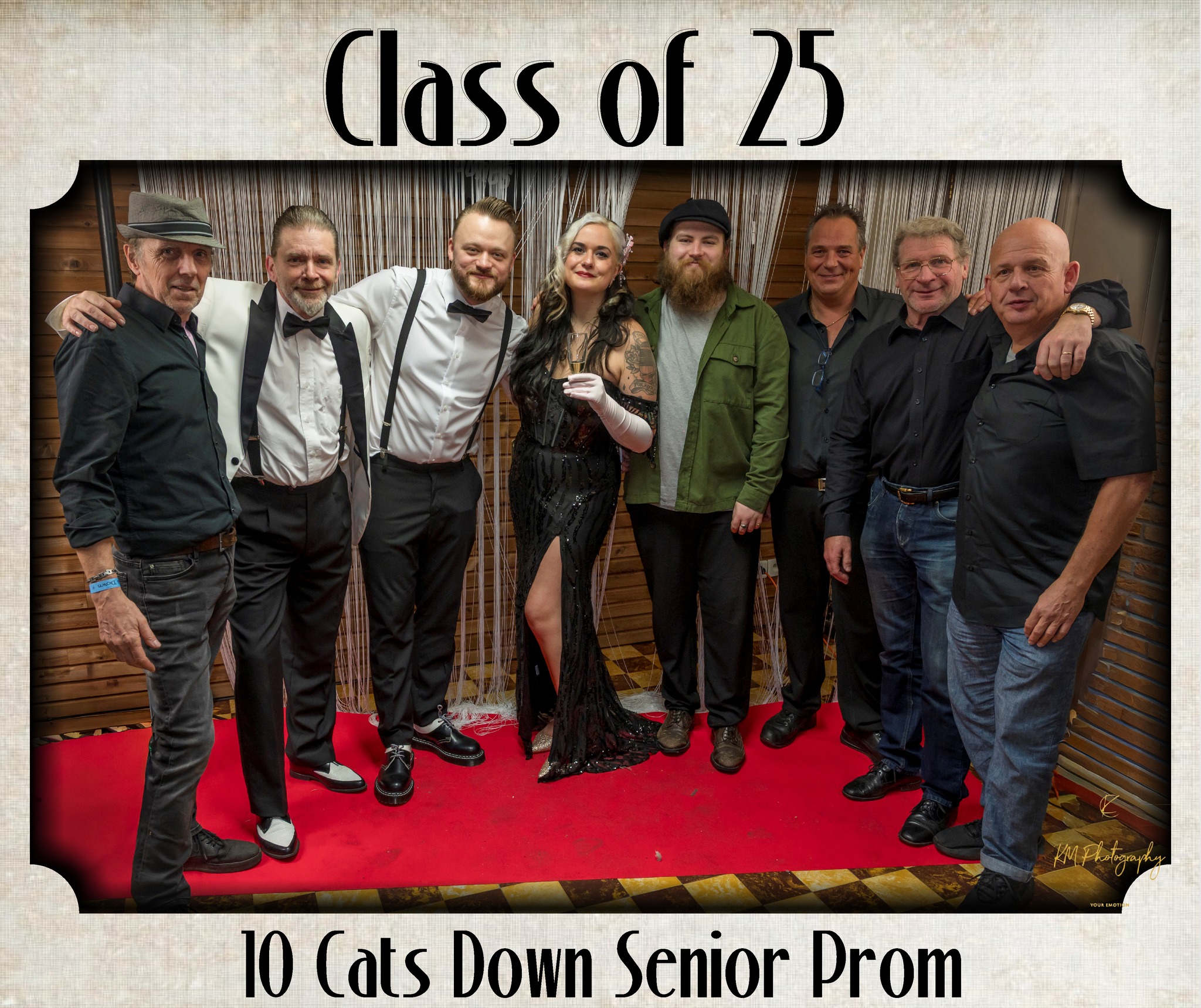 Group photo of guests and band at the prom celebration